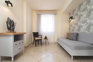 Posezení v ubytování Zeus Village Resort - Adults Only