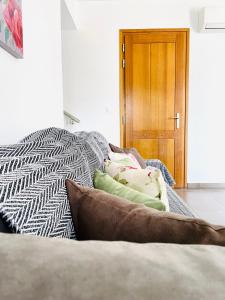 Postel nebo postele na pokoji v ubytování Aricobé