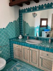 Ένα μπάνιο στο Villa Punta Saline