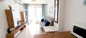 A seating area at Gran Playa View Apartment