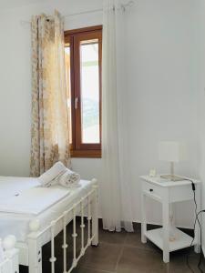 Postel nebo postele na pokoji v ubytování Aricobé