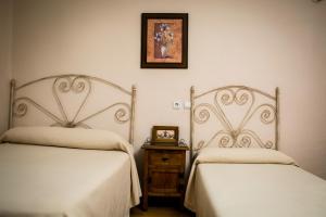 Posteľ alebo postele v izbe v ubytovaní Hostal Restaurante El Paso