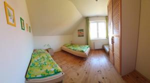 Posteľ alebo postele v izbe v ubytovaní Villa Leika - Panoramablick am Riesengebirge