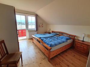 Posteľ alebo postele v izbe v ubytovaní Villa Leika - Panoramablick am Riesengebirge