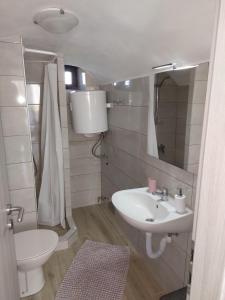 Ванная комната в Apartman Biba