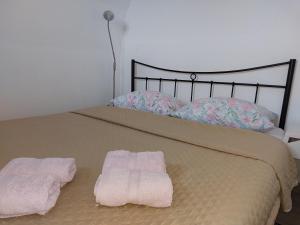 Postel nebo postele na pokoji v ubytování Apartman Biba