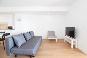 Televízia a/alebo spoločenská miestnosť v ubytovaní Global Properties, Increible apartamento con vistas al mar, Canet d'en Berenguer