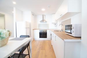 Kuchyňa alebo kuchynka v ubytovaní Global Properties, Increible apartamento con vistas al mar, Canet d'en Berenguer