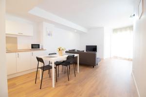 Televízia a/alebo spoločenská miestnosť v ubytovaní Global Properties, Increible apartamento con vistas al mar, Canet d'en Berenguer