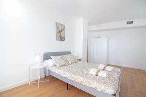 Posteľ alebo postele v izbe v ubytovaní Global Properties, Increible apartamento con vistas al mar, Canet d'en Berenguer