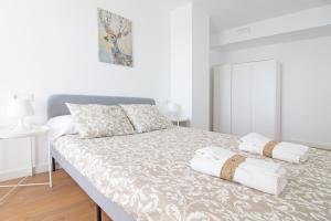 Posteľ alebo postele v izbe v ubytovaní Global Properties, Increible apartamento con vistas al mar, Canet d'en Berenguer