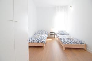 Posteľ alebo postele v izbe v ubytovaní Global Properties, Increible apartamento con vistas al mar, Canet d'en Berenguer