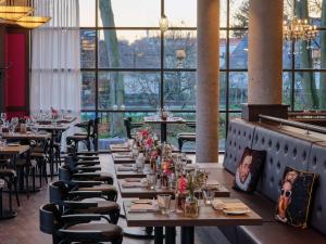 Ein Restaurant oder anderes Speiselokal in der Unterkunft Dorint Parkhotel Frankfurt / Bad Vilbel 