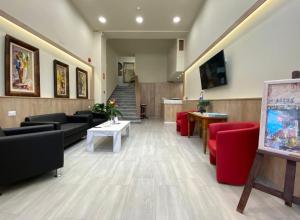 TV a/nebo společenská místnost v ubytování Hotel Citta'