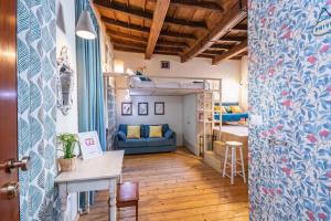 Posedenie v ubytovaní Loft Alma Rosa vicino a Piazza Vittorio