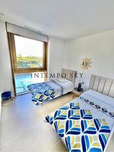 Кровать или кровати в номере INTEMPO SKY Resort & Spa