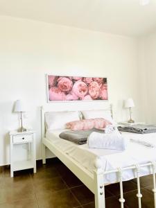 Postel nebo postele na pokoji v ubytování Aricobé