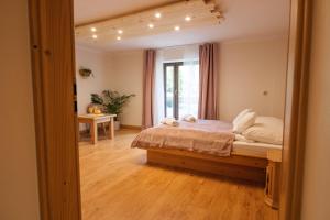 Letto o letti in una camera di Willa jak u Babci