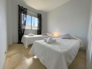 Postel nebo postele na pokoji v ubytování 3 Bed Las Petunias, San Pedro