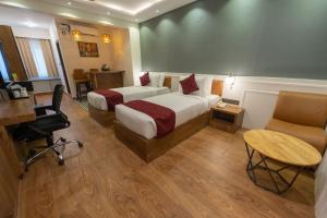 Posezení v ubytování Clarks Inn , Airport Bangalore