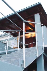 an open door of a building with stairs at Apartment VistaMare Croatia in Luka