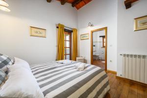 Posteľ alebo postele v izbe v ubytovaní Villa Elaya