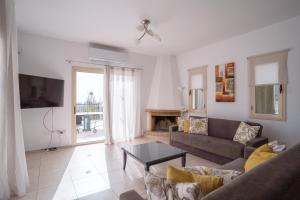 TV a/nebo společenská místnost v ubytování Eframia Dyo by Prestige Bookings