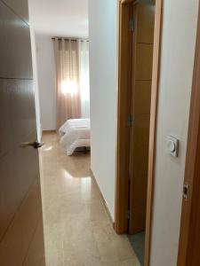 Posteľ alebo postele v izbe v ubytovaní Residencial Vereda Golf
