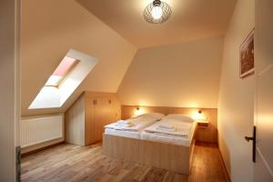 Apartmány Tatra客房内的一张或多张床位