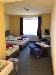 Voodi või voodid majutusasutuse Hotel Holdfény toas