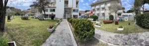 Vonkajšia záhrada v ubytovaní Hotel Amedea
