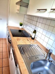 a kitchen with a sink and a counter top at Chalet Waldheim in Zell am Ziller