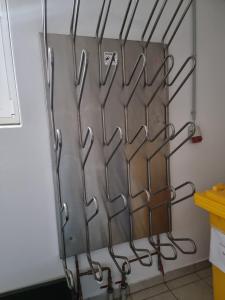 a group of utensils hanging on a wall at Chalet Waldheim in Zell am Ziller