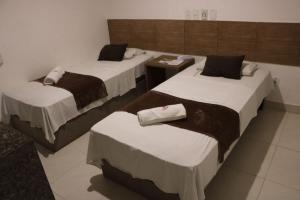 Postel nebo postele na pokoji v ubytování Onix Hotel Praia de Piata + 20 fotografií