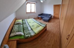 Postel nebo postele na pokoji v ubytování Apartmán Znojmo