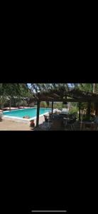 Bazén v ubytování villa de pedriza 1 nebo v jeho okolí
