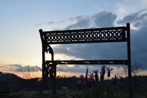 The sunrise or sunset as seen from a panziókat or nearby