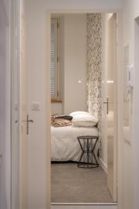 Giường trong phòng chung tại Appartement R1 T2 Rodez Centre Historique
