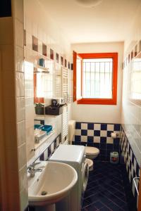 A bathroom at Appartamento in residence Lighthouse