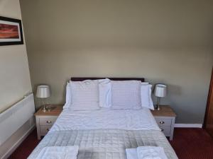 Кровать или кровати в номере The Anchor Hotel