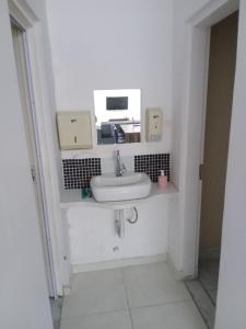 Ванная комната в Hostel com quartos individuais