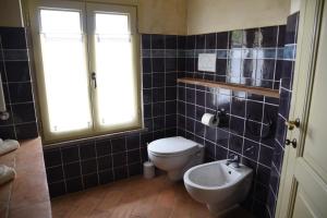 Koupelna v ubytování Agriturismo Poggio ai Legni