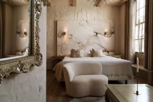 Postel nebo postele na pokoji v ubytování Boutique Hotel Elburg met Tapperij