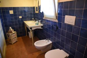Koupelna v ubytování Agriturismo Poggio ai Legni