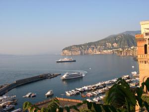 a group of boats docked in a harbor on the water at Terra e Mare in Sorrento