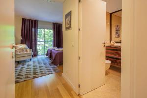 Postel nebo postele na pokoji v ubytování Cidadela - Luxury Apt with Pool