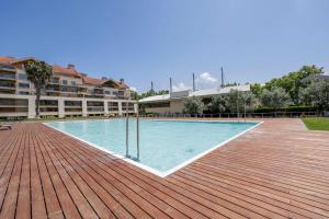 Bazén v ubytování Cidadela - Luxury Apt with Pool nebo v jeho okolí