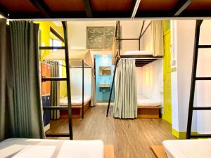 Postel nebo postele na pokoji v ubytování 澎湖北吉光背包客民宿 Bayhouse Hostel Penghu
