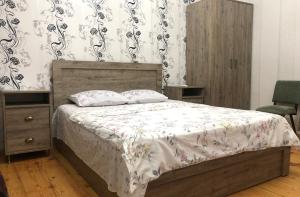سرير أو أسرّة في غرفة في Hotel Martinichi