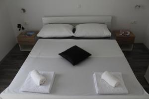 Posteľ alebo postele v izbe v ubytovaní Top Floor Apartment
